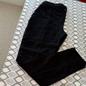 bebe ladies Elegant Black Dress legging with leg seam front and back. Sz Large